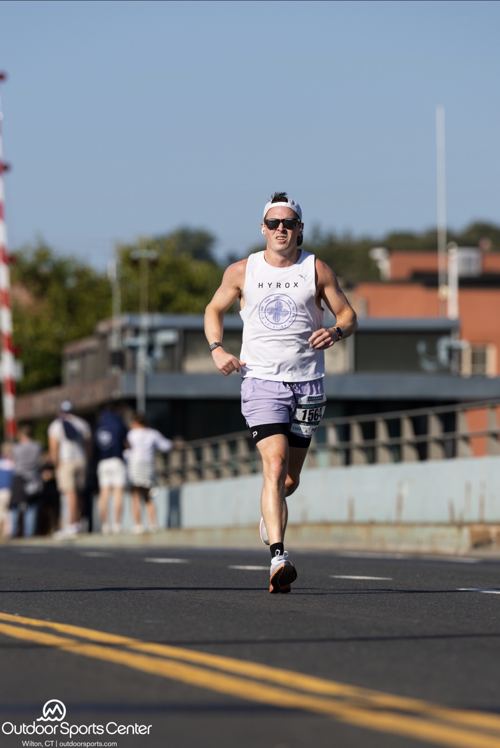 Coach Ryan training, mid-stride during a run session